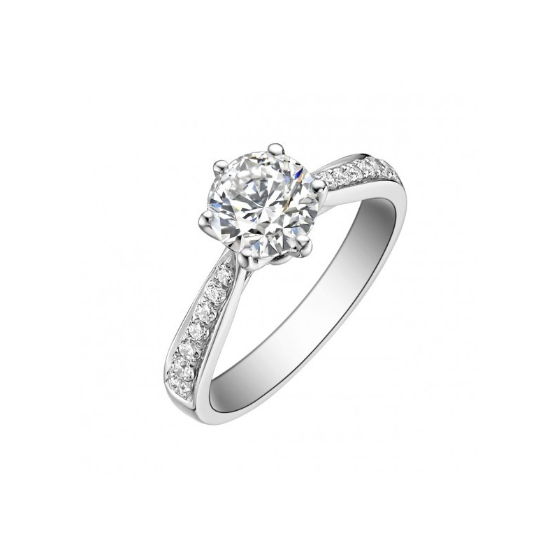 Platinum Solitaire with Shoulder Stones Engagement Ring.